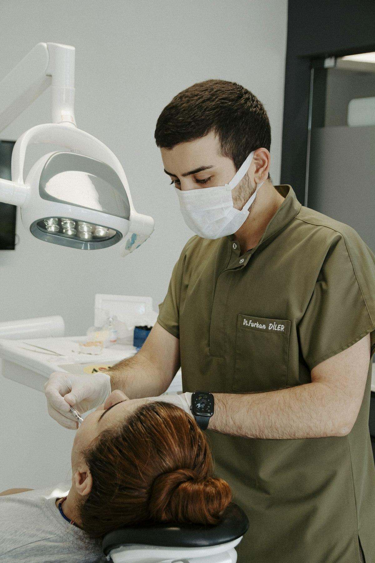 Dentist consulting with a patient