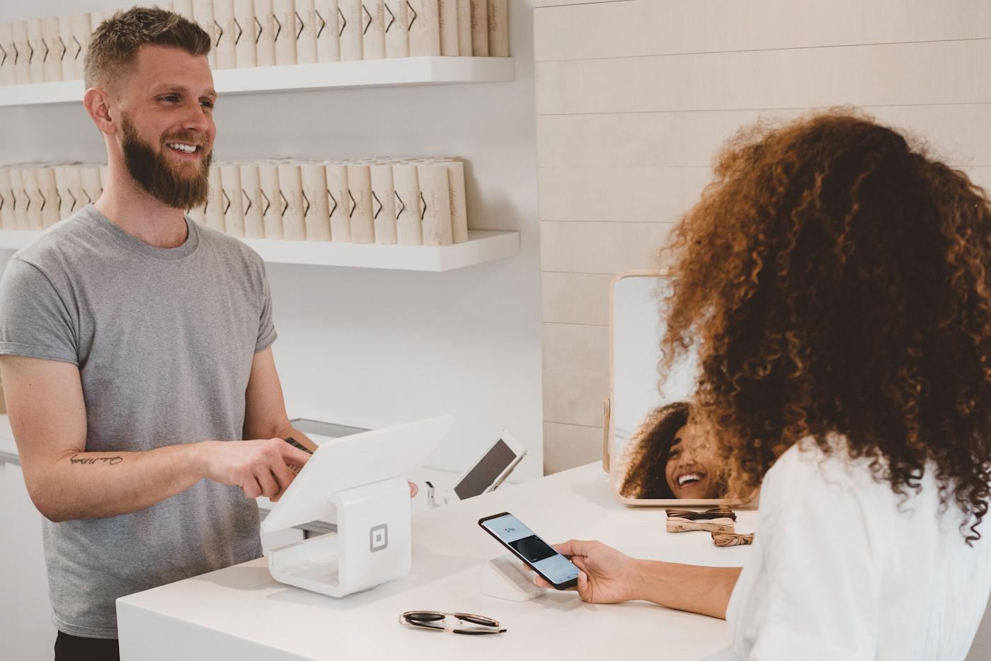 Business owner providing attentive customer service